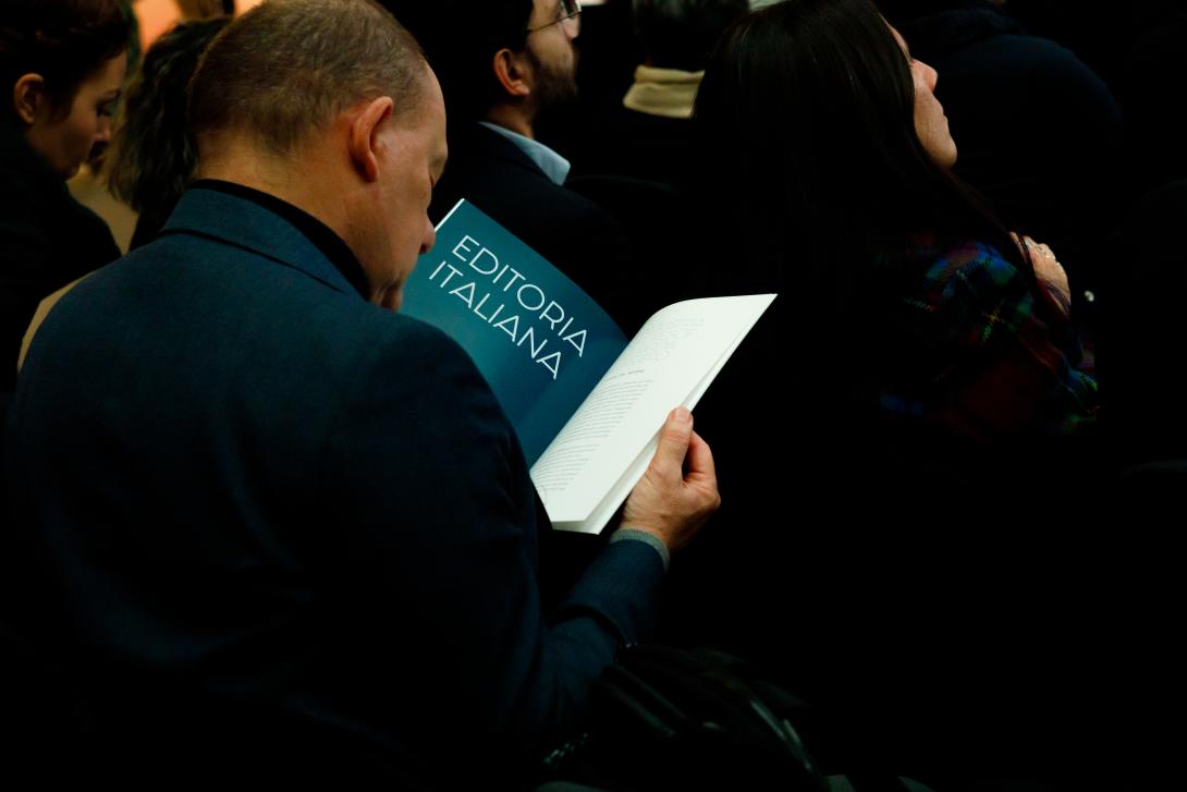 Man Reading Brochure